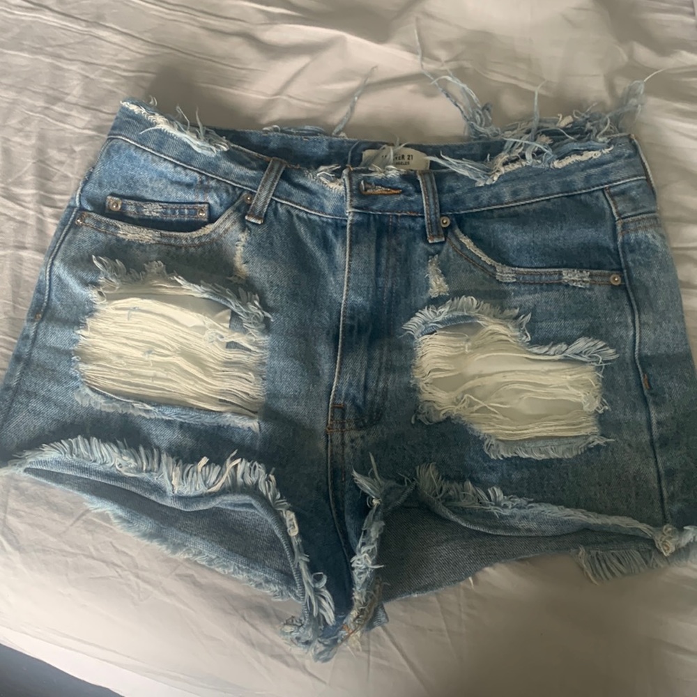 Super cute distressed denim shorts